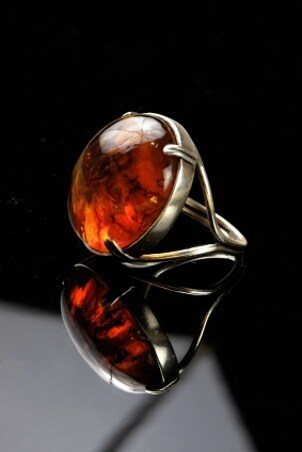 Men's gemstone jewelry ring with an amber gem