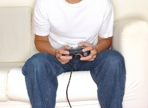Video gamer in front of the TV