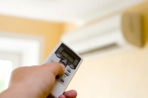 White air conditing unit controlled by remote control