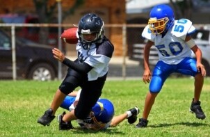 Kids enjoying a safe game of football