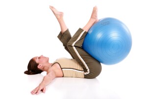 A woman enjoying a pilates workout