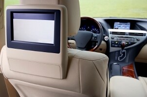 Mobile video headrest monitor in a luxury car