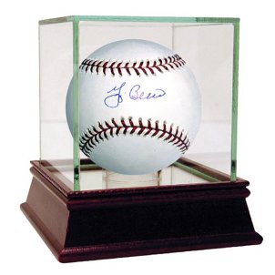 Signed sports collectibles in a glass case