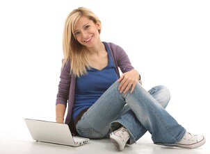 Girl holding a netbook PC computer