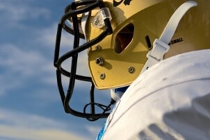Football helmet and shoulder pads