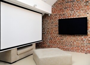 Home theater projector screen in a modern living room