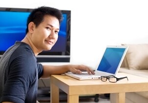 Videographer creating movies with video software