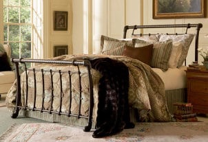 Comfortable bed with a bed skirt and oversized duvet