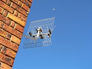 High definition TV antenna on a brick wall