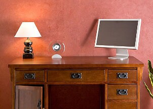 Widescreen computer monitor on a desk
