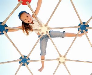 Girl climbing on a playground