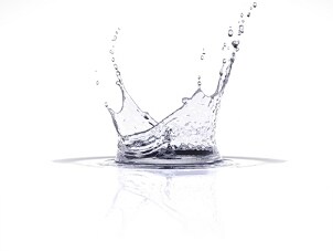 Drop of water splashing from a water filter