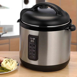 Stainless steel rice cooker sits on kitchen counter
