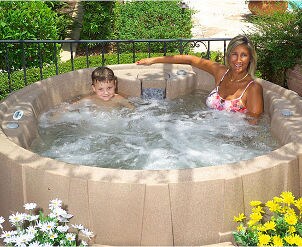 Mother and son enjoying a hot tub