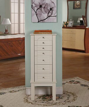 A pretty walnut jewelry armoire