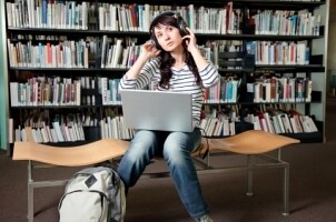 Teenage girl studying at school