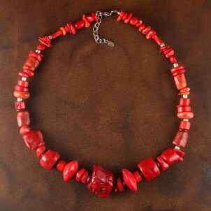 A bold red handmade coral necklace