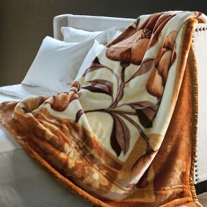 Plush clearance blanket on a bed