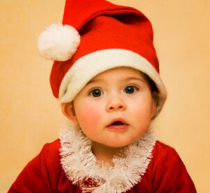 Cute baby girl dressed for Christmas
