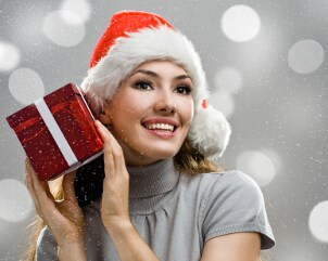 A pretty teenager receives a holiday gift