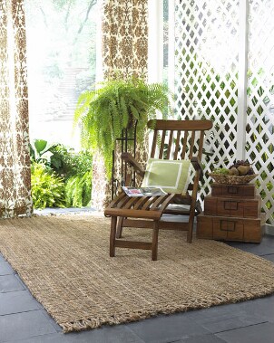 An earthy jute rug on a patio
